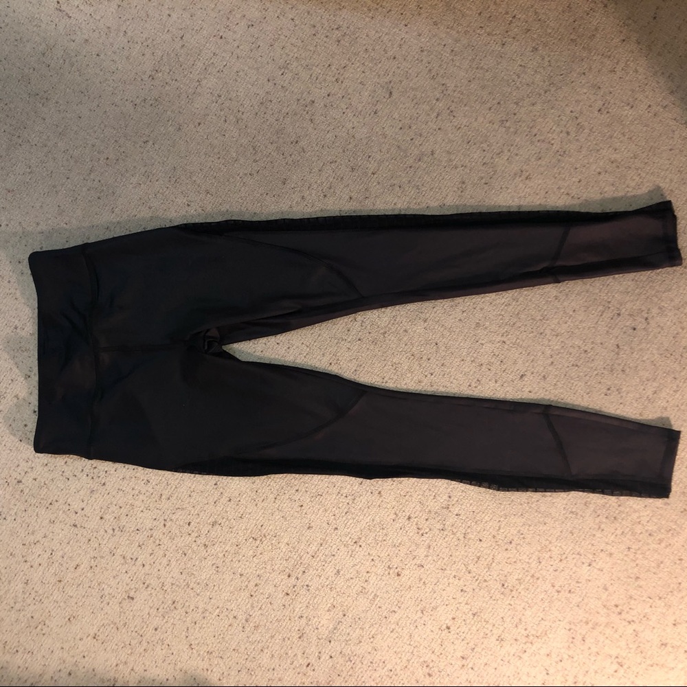 Black and partly sheer leggings